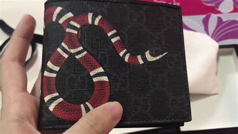 gucci real vs fake wallet|authentic gucci snake wallet.